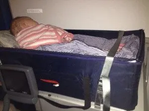 flying with a baby travel cot
