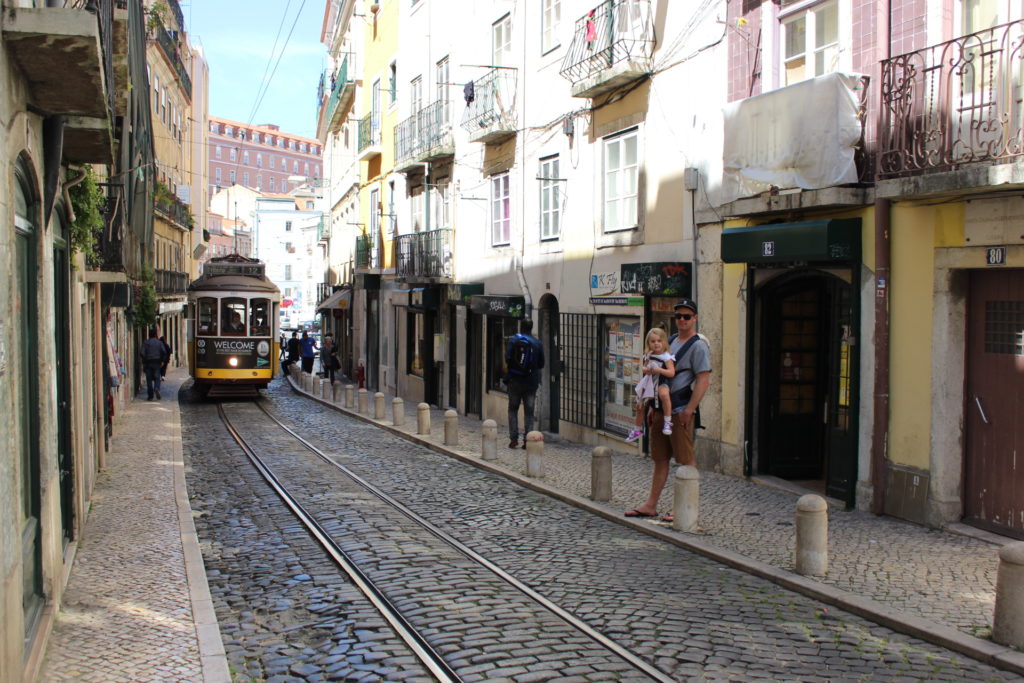 Things to do in Lisbon with kids, such as riding on the vintage trams! 