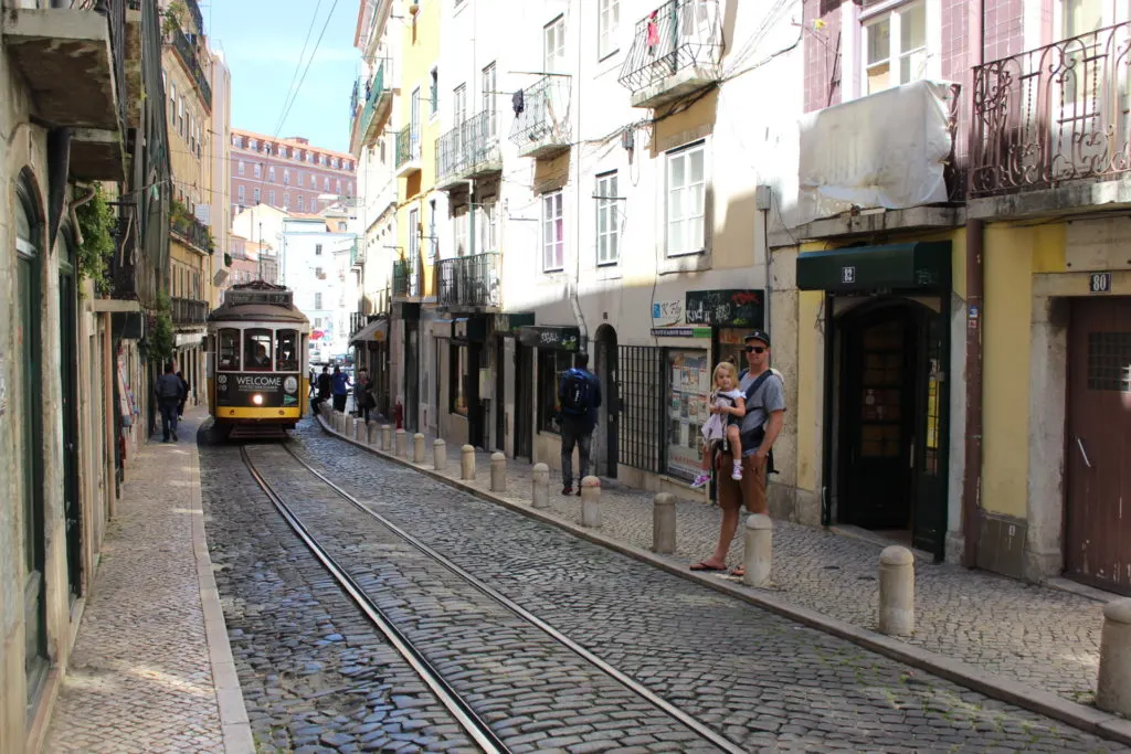 Things to do in Lisbon with kids, such as riding on the vintage trams! 