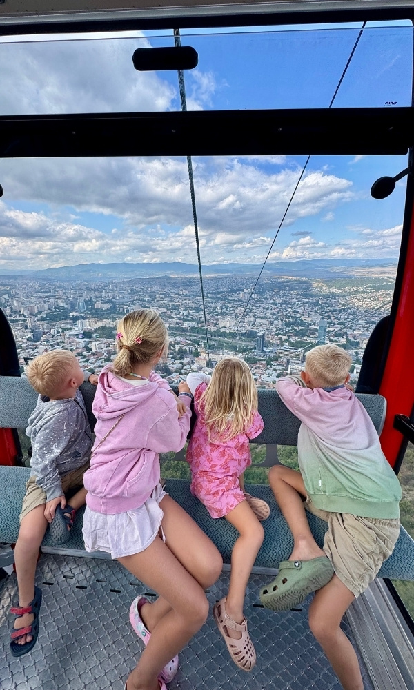 taking the cable car in Tbilisi with kids 